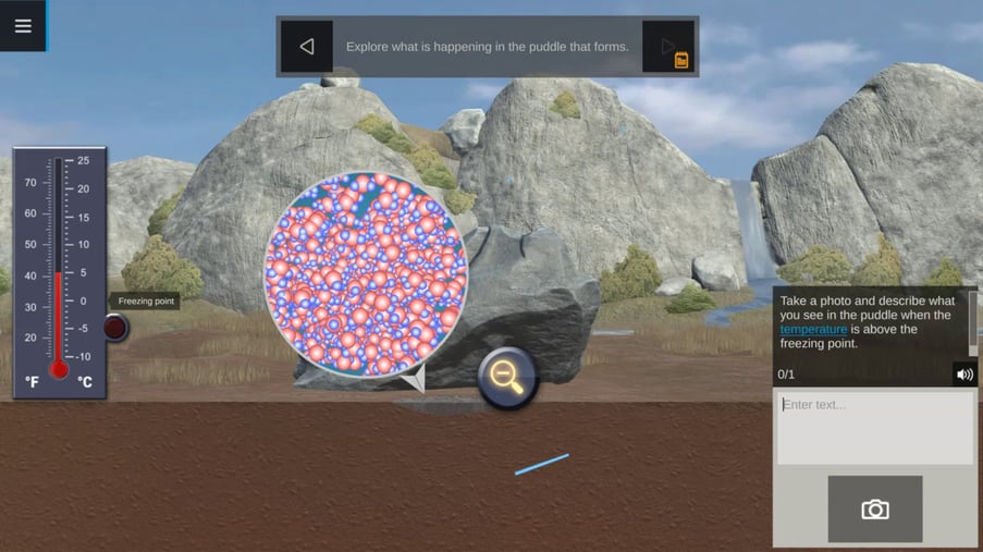 zSpace Experiences application displays a lesson titled 'Weathering - Freeze and Thaw.' The digital simulation shows a natural rocky landscape with a waterfall in the background. A thermometer on the left indicates the temperature is above freezing, and a magnified view of water molecules in a puddle shows their structure at this temperature. The interface encourages users to explore how molecular changes occur as the temperature varies, making this an engaging educational tool for understanding the weathering process through freeze and thaw cycles.